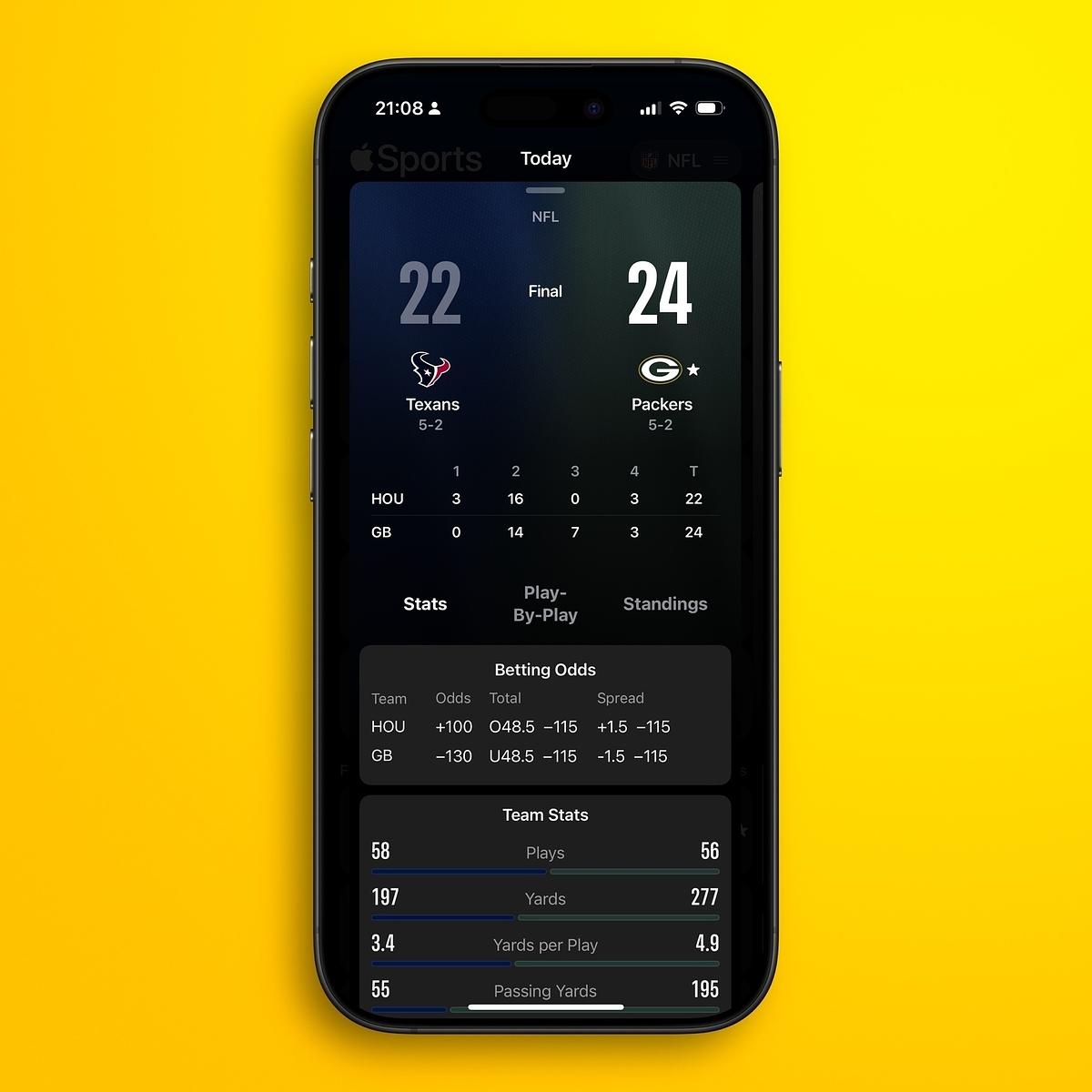 An iPhone displays the final score of a football game with the Packers defeating the Texans 24-22, along with game stats and betting odds.